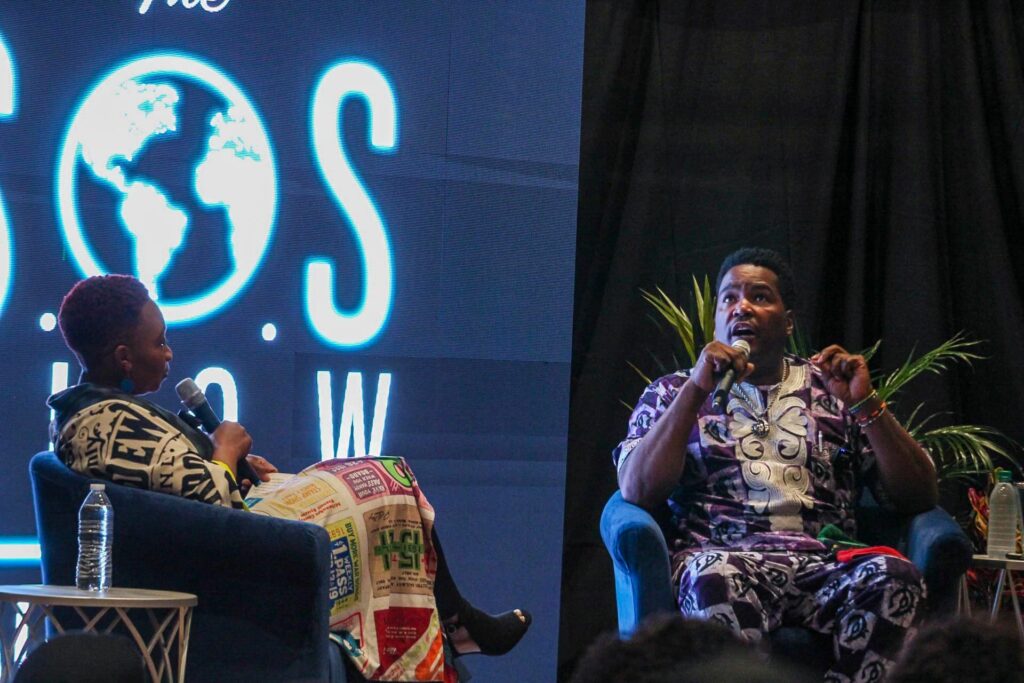 Mary Evans On Stage at the S.O.S Show with Guest Dr. Umar Johnson